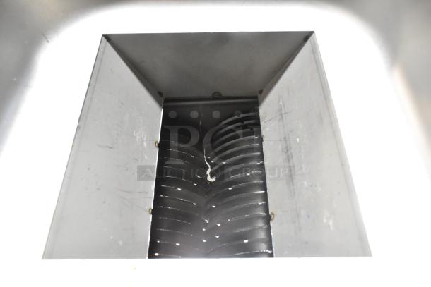 MS-02 metal countertop meat slicer, 110V, 1 phase. Features include sharp slicing blades. Appears lightly used.