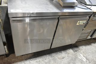 Avantco 178SSUC48FHC stainless steel undercounter freezer with 2 doors, commercial casters, and 115V, 1 phase power.