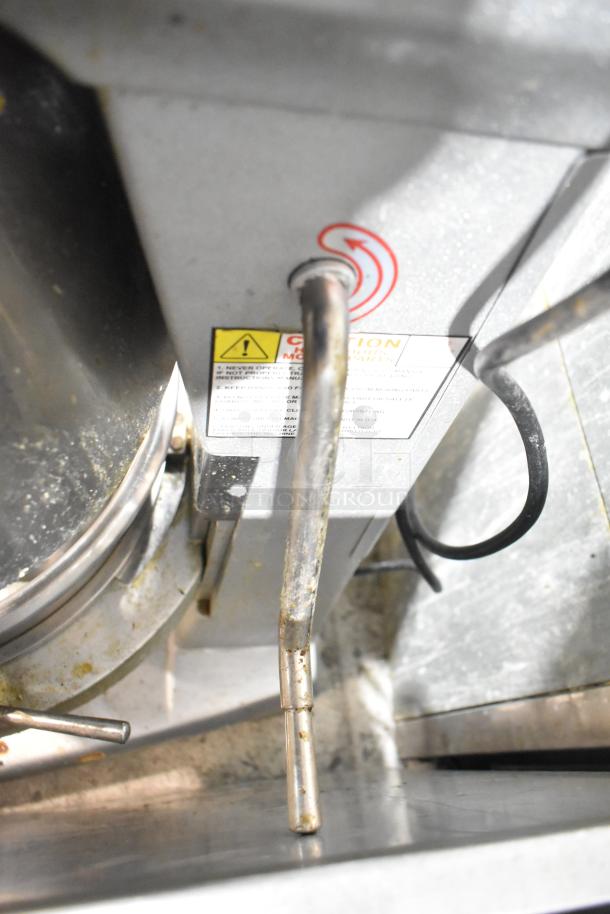 Skyfood metal commercial planetary dough mixer with mixing bowl, bowl guard, dough hook, paddle, whisk; used condition.