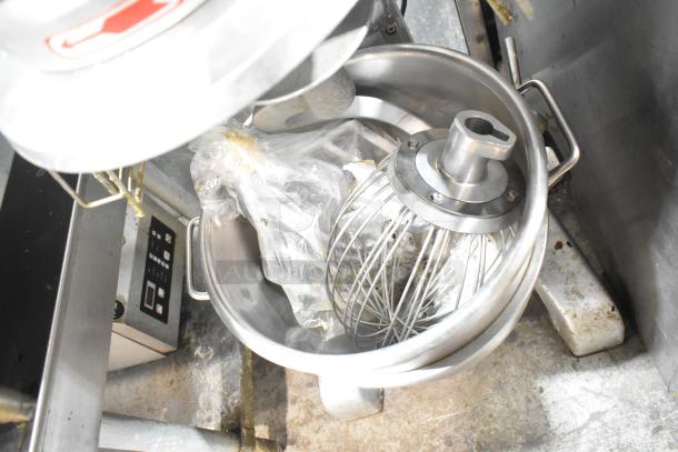 Skyfood metal commercial planetary dough mixer includes mixing bowl, bowl guard, dough hook, paddle, and whisk.