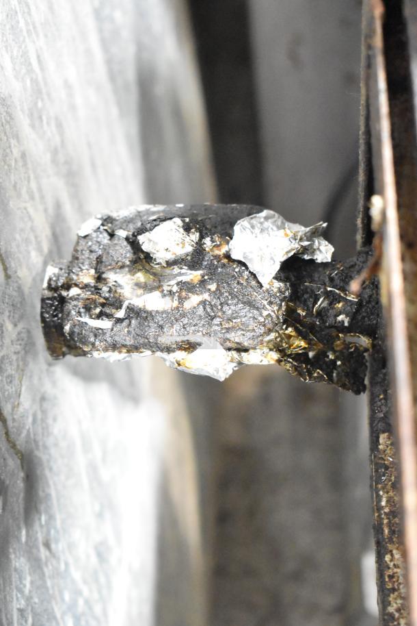 Corroded component detail of Star Max Stainless Steel Commercial 6 Burner Range. Signs of heavy use and wear.