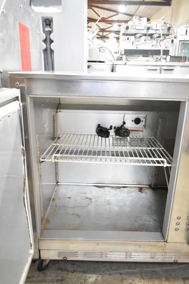Beverage Air UCR48A stainless steel 2-door undercounter cooler on casters. Features include shelving and interior wiring.