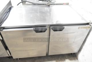 Beverage Air UCR48A stainless steel 2-door undercounter cooler on casters, 115V, showcasing used condition.