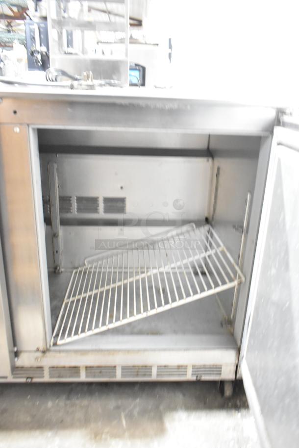 Beverage Air UCR48A stainless steel 2-door undercounter cooler. Features commercial casters and a shelf. 115V, 1 phase.