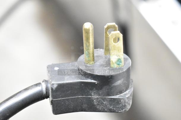 Power plug detail of Beverage Air UCR48A stainless steel commercial 2-door undercounter cooler, 115 volts, 1 phase.