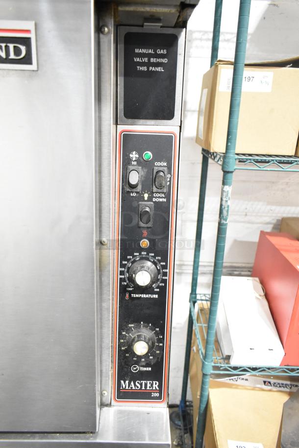 Garland Master 200 stainless steel commercial convection oven control panel with thermostatic controls and manual gas valve.