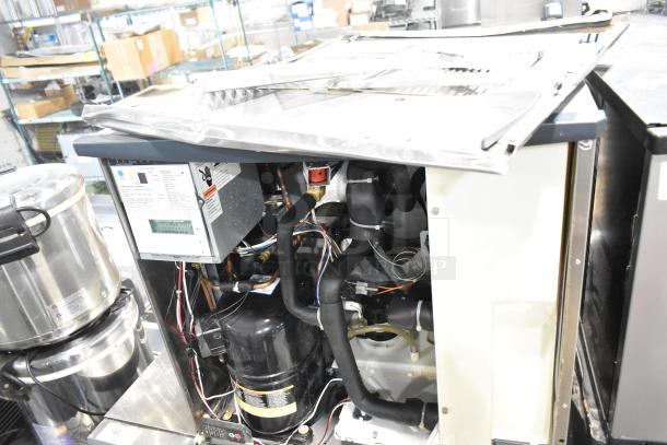 2017 Scotsman C0830SA-32D stainless steel commercial ice machine head on BH800S-C ice bin; visible wiring and labels.