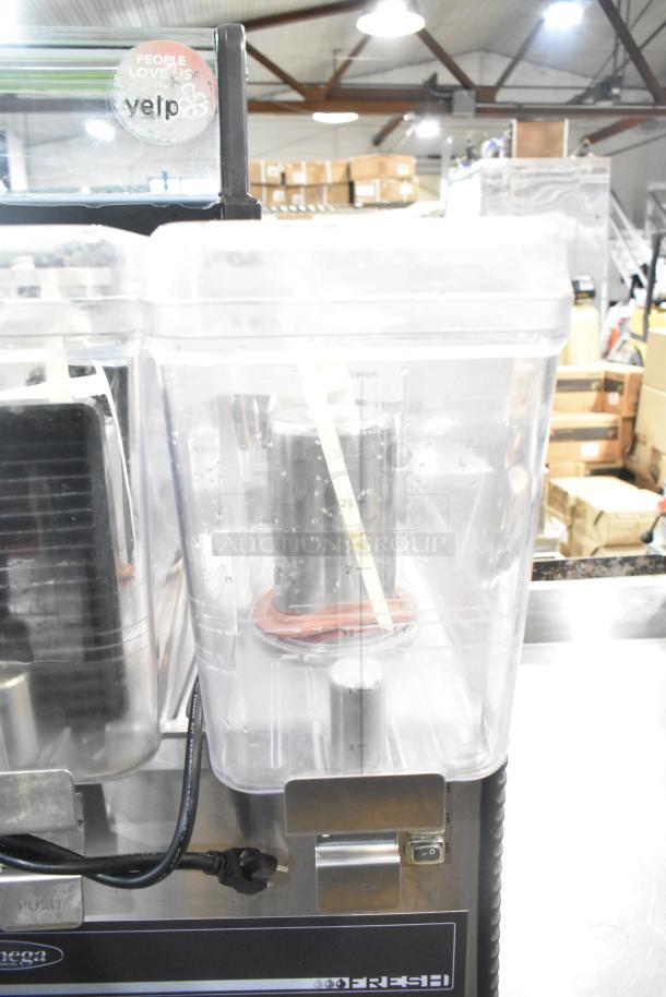 Omega OSD20 metal commercial beverage machine, 2 hoppers. 120 volts, 1 phase. Clear hoppers with measurement markings.