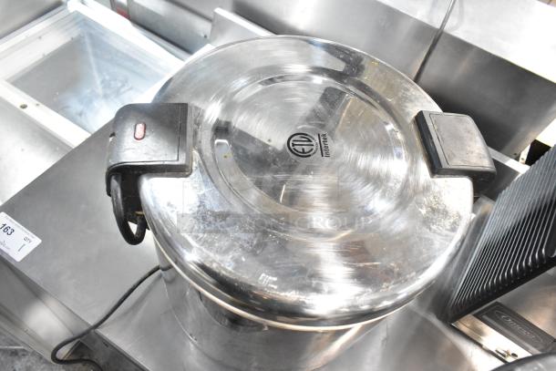 Two stainless steel countertop electric rice warmers; Thundergroup SEJ-22000, Zojirushi THA-803S; 120V, 1 Phase; good condition.