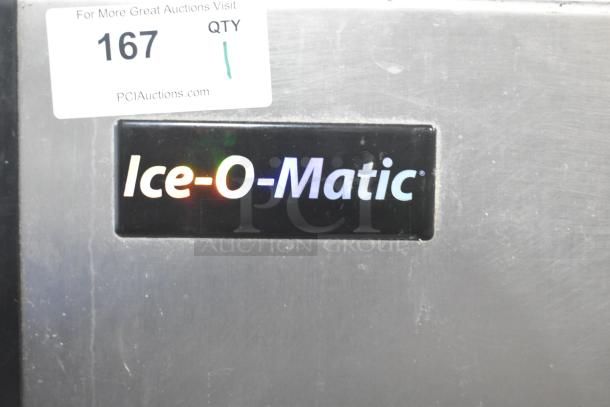 Ice-O-Matic ICE0400FW4 stainless steel commercial ice machine head with B40PSB bin, 115V, 1 phase, auction tag visible.
