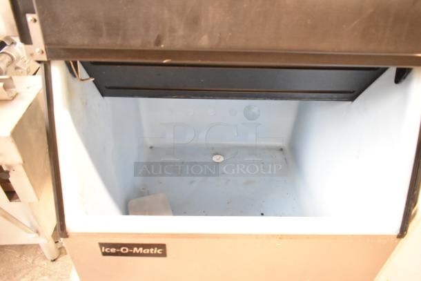 Ice-O-Matic ICE0400FW4 commercial ice machine head on B40PSB bin, stainless steel, 115V, 1-phase, visible brand label.
