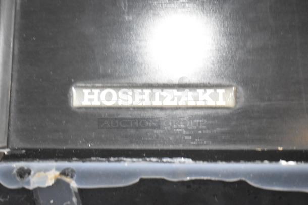 Hoshizaki HNC-210AA-L countertop sushi display case, metal, 115V, 1 phase. Features brand logo on the surface.
