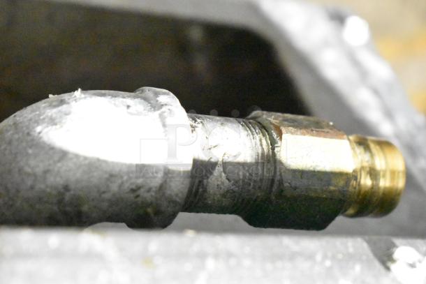 2018 Pitco Frialator SG14 gas fryer component, showing metal pipe fitting.