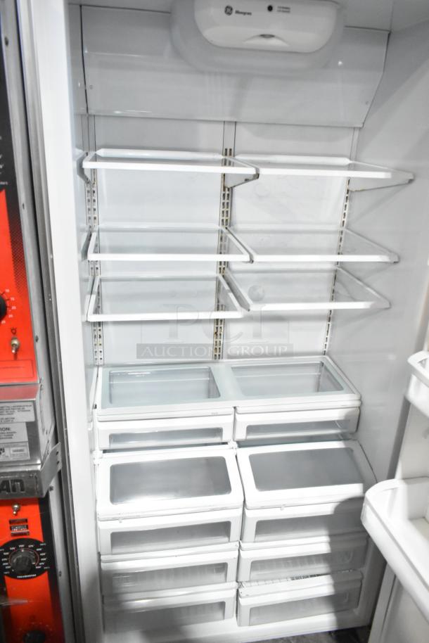 General Electric GE Monogram stainless steel reach-in cooler with shelves. 115 volts, 1 phase. Clean, excellent condition.