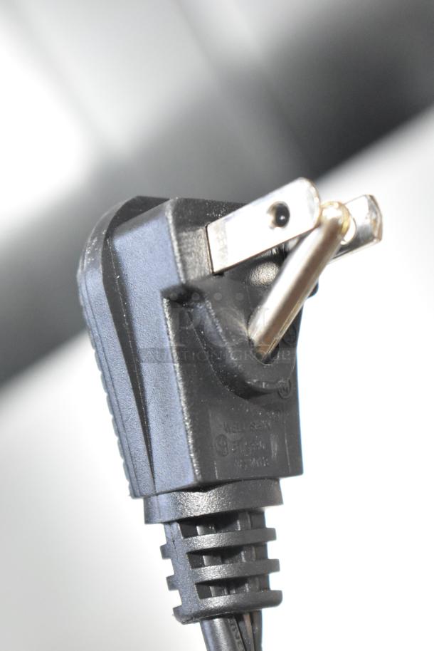 Black power plug for General Electric GE Monogram Cooler, 115 volts, 1 phase, close-up view.
