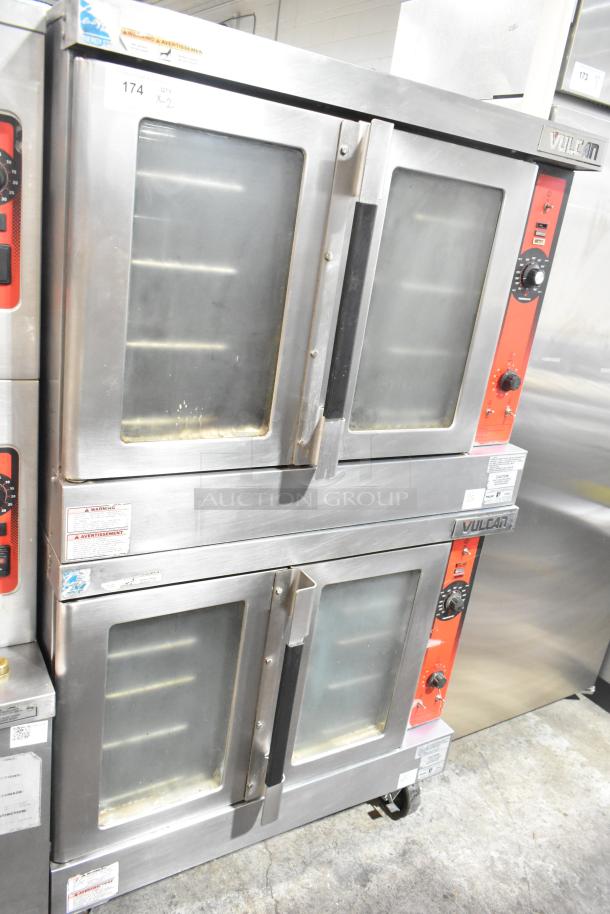 Vulcan VC4GD-11D350K stainless steel convection ovens, gas powered, view-through doors, metal racks, on casters.