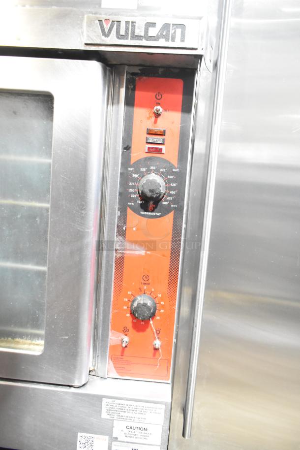 Vulcan VC4GD-11D350K stainless steel convection oven with view-through doors, metal racks, and thermostatic controls.