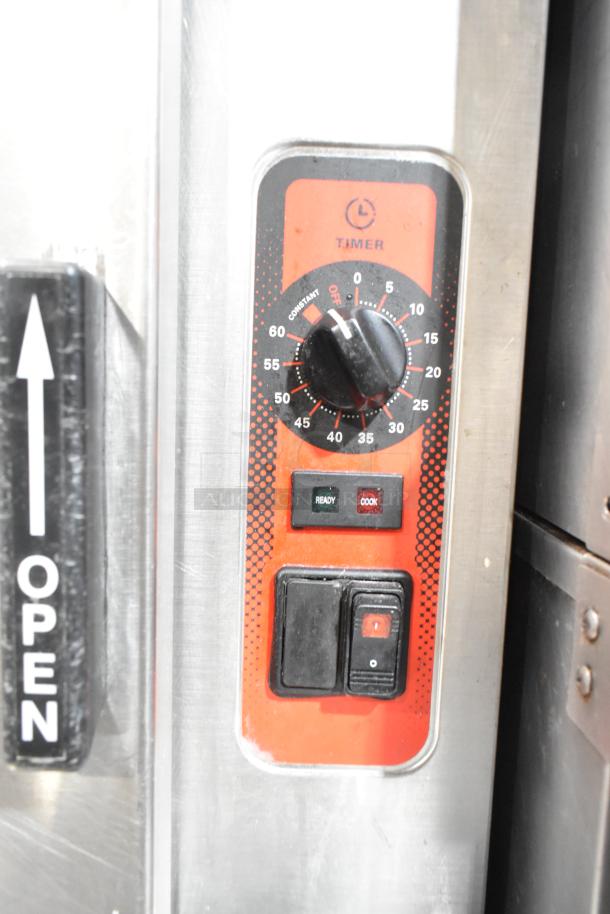 Vulcan stainless steel 2 deck steam cabinet with timer and control switches, minor wear visible.