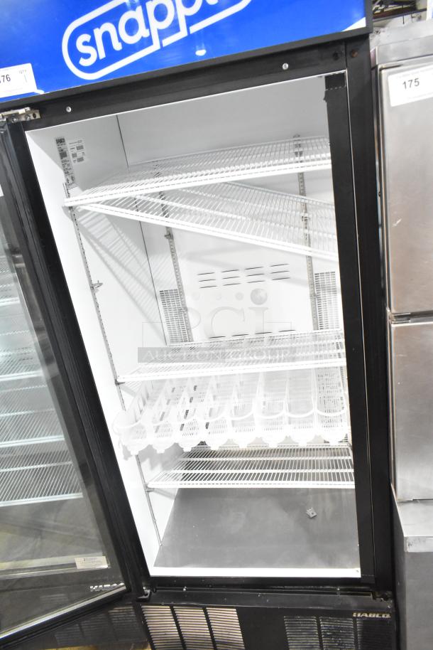 Habco ESM28 metal commercial single door reach-in cooler merchandiser; includes poly coated racks, 115 volts, 1 phase.