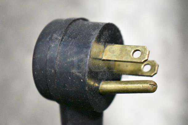 Close-up of a power plug for the Habco ESM28 commercial cooler, showing a 3-prong connector.