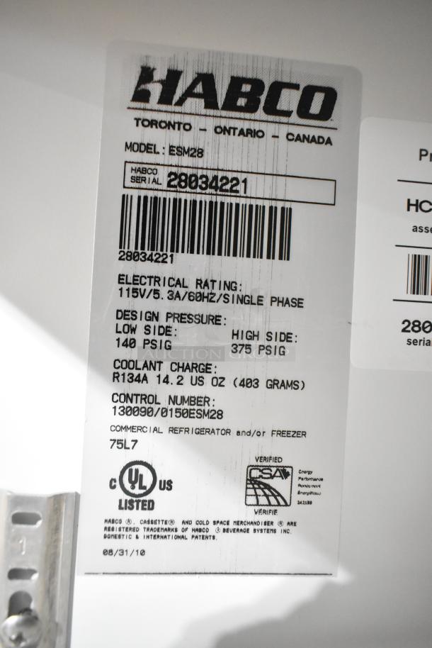 Habco ESM28 label showing serial number 28034221, electrical rating 115V/5.3A/60Hz, and CSA verification.