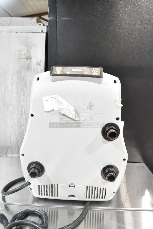 Brand new 2025 Avenli AV1000SP inflatable hot tub control unit. Model 351S36SBN, 120V. Tags indicate compliance and caution details.