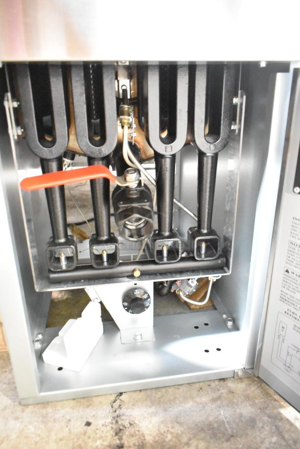 Brand new Avantco 177FF50N stainless steel commercial natural gas fryer, 120,000 BTU, with two metal baskets. Scratch and dent condition.