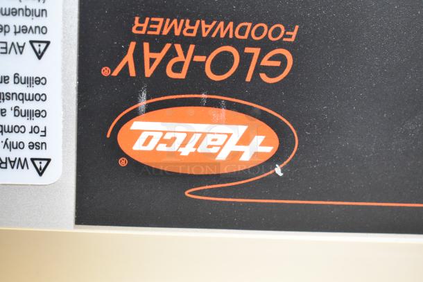 Hatco GRAH-60 Glo-Ray infrared food warmer label showing model and brand, detailing usage warnings.
