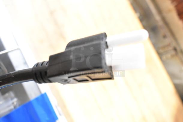 Close-up of black electrical plug for Hatco GRAH-60 Glo-Ray infrared food warmer, 60", 120V, 1 phase.