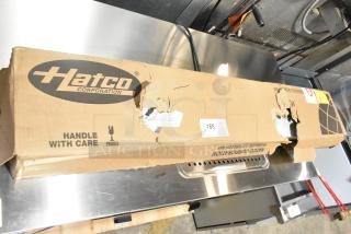 Brand new Hatco GRAH-48 infrared food warmer, 48" high wattage, 120V, 1 phase. Box shows scratches and dents.