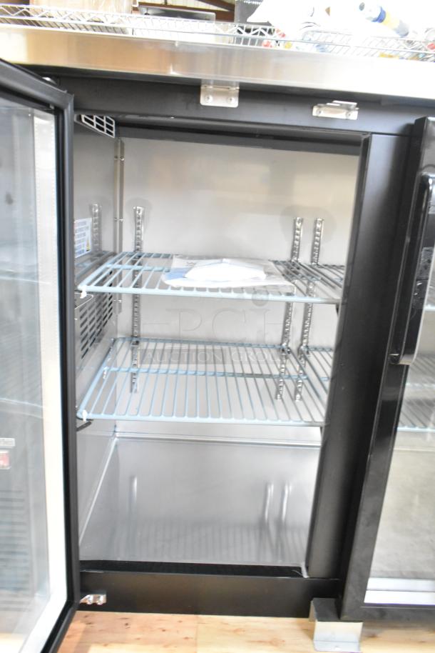 Brand new Avantco 178UBB48GHC 48" black bar refrigerator, two glass doors, LED lighting, minor cosmetic scratch and dent.