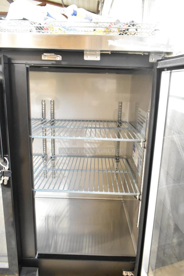 Brand new Avantco 178UBB48GHC 48" black bar refrigerator, narrow glass door, LED lighting, 115V, with slight dent.