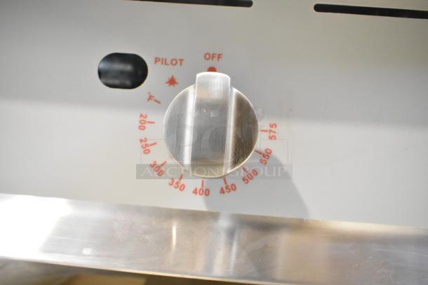BRAND NEW Cooking Performance Group stainless steel gas griddle knob with temperature markings up to 575°F.