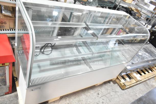 Brand new Avantco 193BCD72W 72" curved glass white bakery display case, metal construction, 110-120V, 1 Phase.