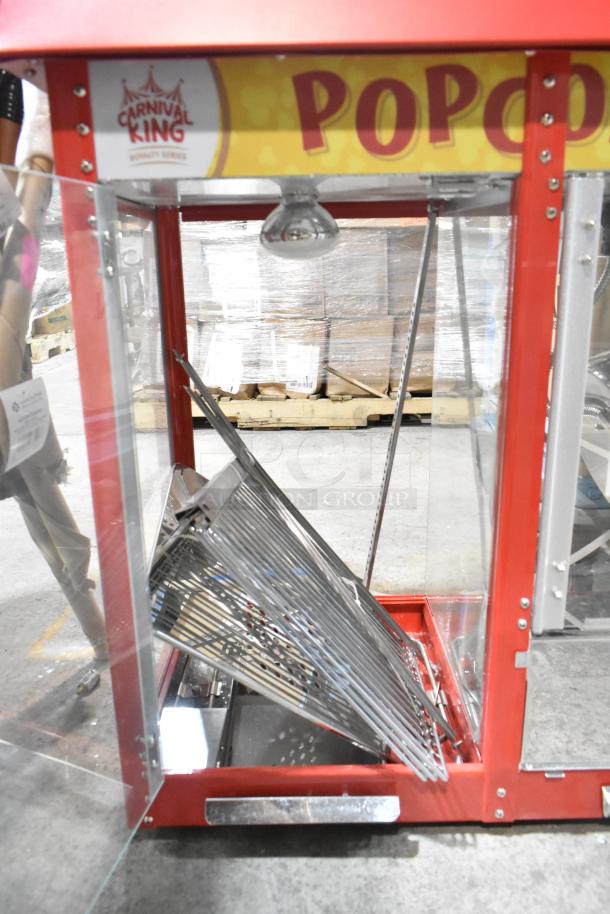 Carnival King 382PMW17R popcorn machine, red with clear panels, warming merchandiser, brand new, scratch and dent condition.