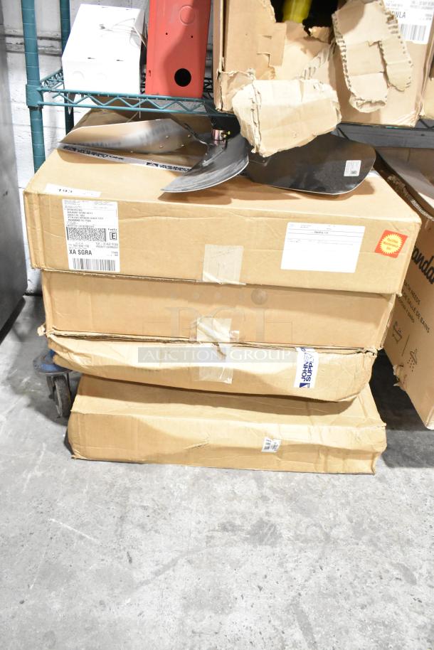 Stack of cardboard boxes containing 5 brand new items, including an InterLink 22900301S fan blade. Boxes show shipping labels and slight wear.