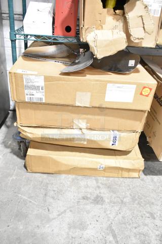 Stack of cardboard boxes containing 5 brand new items, including an InterLink 22900301S fan blade. Boxes show shipping labels and slight wear.