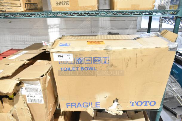 BRAND NEW Toto CT725CUFG#01 toilet in original packaging. Features TORNADO FLUSH®, top spud, floor mounted, universal height.