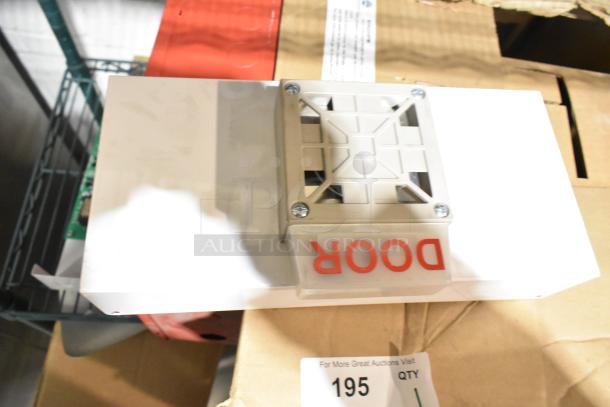 Altronix AL1002ULADA fire alarm box with "DOOR" panel, in good condition. Box and label visible.