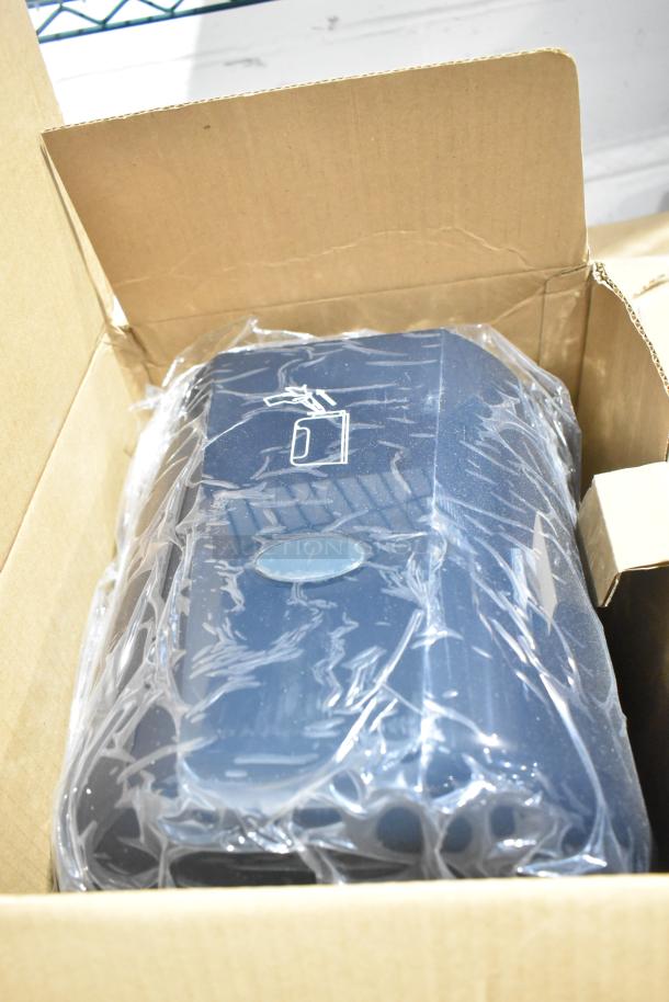 Brand new DS-500 Centerpull Towel Dispenser in packaging. Includes Ecolab Foam Hand Sanitizer. Three items total.