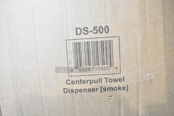 "DS-500 Centerpull Towel Dispenser box, smoke color, barcode visible. Part of a set with Ecolab Foam Hand Sanitizer."