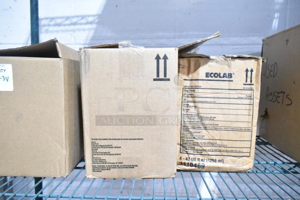 Three brand new items: DS-500 Centerpull Towel Dispenser, Ecolab Foam Hand Sanitizer in original packaging on a shelf.