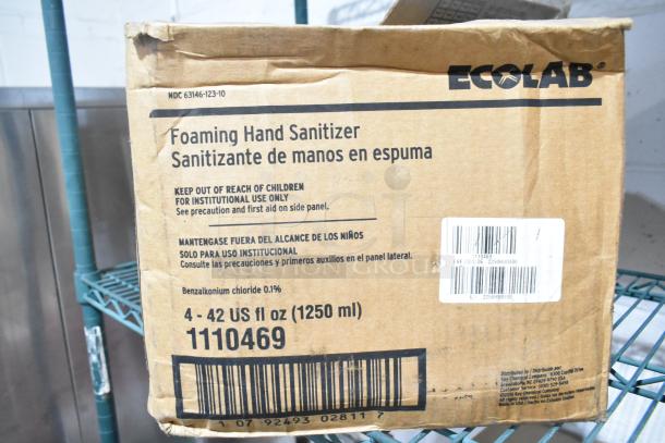 Cardboard box of Ecolab Foaming Hand Sanitizer, containing 4 bottles of 42 fl oz each. Labeled for institutional use.