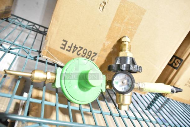 Box of 5 brand-new gauges, featuring a Zephyr regulator, brass connections, and pressure indicator. Mint condition.