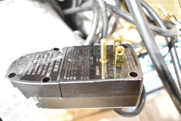 BRAND NEW Flowclear 330 gal. Filter Pump plug, model 302001003726, gold prongs, black casing, wiring visible.