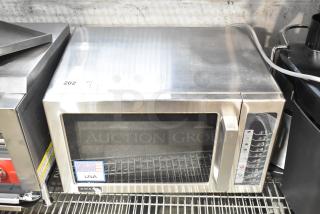 Brand new Amana RCS10TS stainless steel commercial microwave, stackable, with push button controls. 120V, 1 Phase.