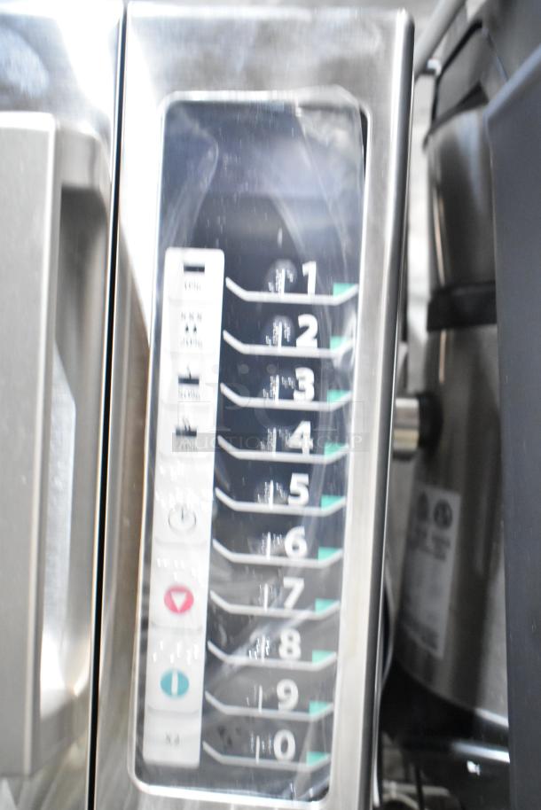 Amana RCS10TS stainless steel commercial microwave with push button controls; new, slight cosmetic scratches.