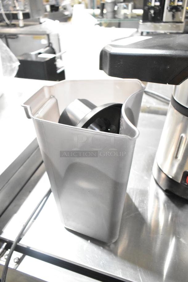 BRAND NEW 2025 AvaMix 928JE700 juice extractor with scratch and dent; stainless steel, continuous feed, visible pulp ejection.