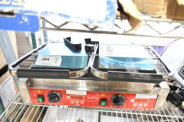 Brand new Avantco 177PG400T dual panini grill, grooved plates, 19 5/8" x 9 1/8" surface, with timer, slight scratch and dent.