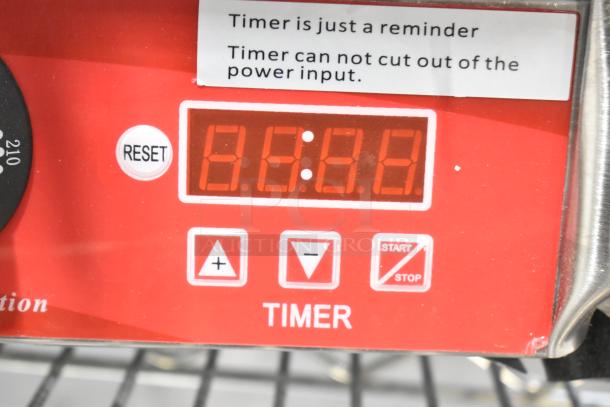 Alt text: Close-up of Avantco 177PG400T Panini Grill timer display with reset and start/stop buttons.